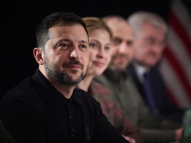 This handout photograph taken and released by Ukrainian Presidential press-service in Munich on February 14, 2025 shows President of Ukraine Volodymyr Zelensky (L) listening to the Vice President of the United States (not in picture) during their talks on the sidelines of the Munich Security Conference. (Photo by Handout / UKRAINIAN PRESIDENTIAL PRESS SERVICE / AFP) / RESTRICTED TO EDITORIAL USE - MANDATORY CREDIT "AFP PHOTO / UKRAINIAN PRESIDENTIAL PRESS SERVICE" - NO MARKETING NO ADVERTISING CAMPAIGNS - DISTRIBUTED AS A SERVICE TO CLIENTS