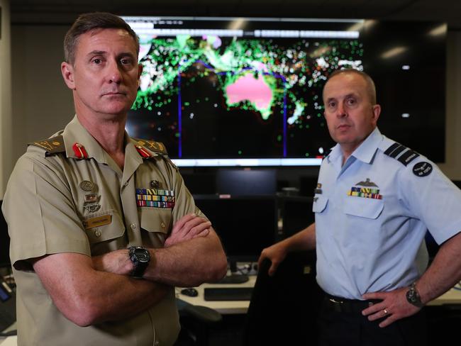 The in-coming Commander Joint Agency Task Force , Operation Sovereign Borders, Major General Craig Furini, together with outgoing Commander Joint Agency Task Force , Operation Sovereign Borders, Air Vice-Marshal Stephen Osborne in the Martime Border Command Op Centre, in Canberra.