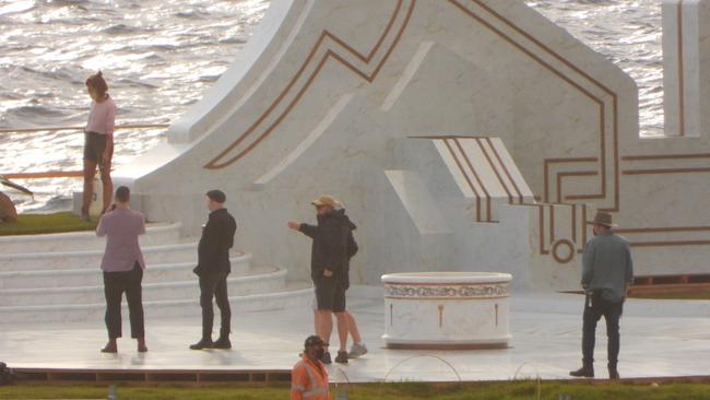 Taika Waititi (purple jacket) was seen on set at Little Bay on Tuesday morning. Picture: John Grainger