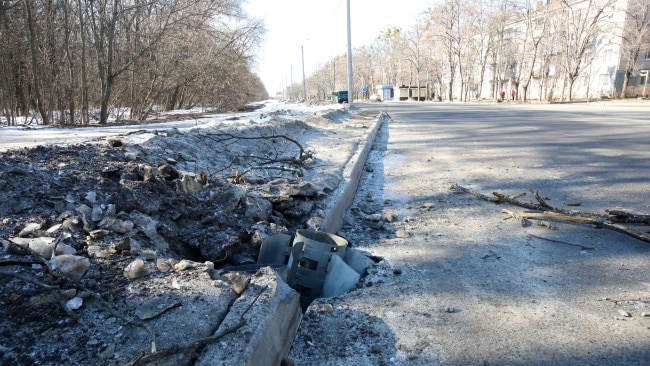 A rocket embedded in a road after shelling by Russian troops of a residential area in Piatykhatky, Kharkiv, northeastern Ukraine. Picture: Getty Images