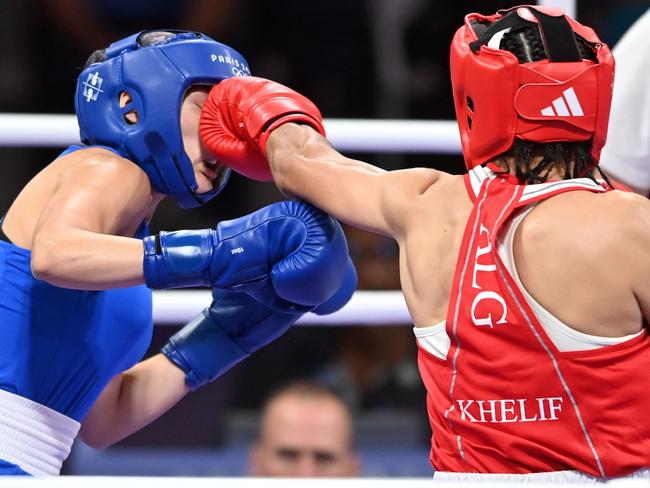 Angela Carini (left) abandoned her bout against Imane Khelif after just 46 seconds. Picture: Getty Images