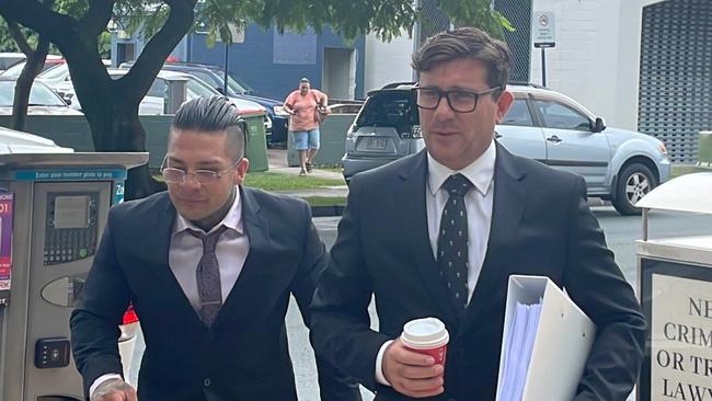 Christos Panagakos (left) with his lawyer Michael Gatenby outside Southport Courthouse. Picture: Lea Emery