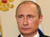 Russia's President Vladimir Putin looks on in the Novo-Ogaryovo residence outside Moscow, early on July 21, 2014, while recording his video address on the Malaysia Airlines crash. In his overnight video address shown today in the early hours Putin said that the Malaysia Airlines crash should not be used for 