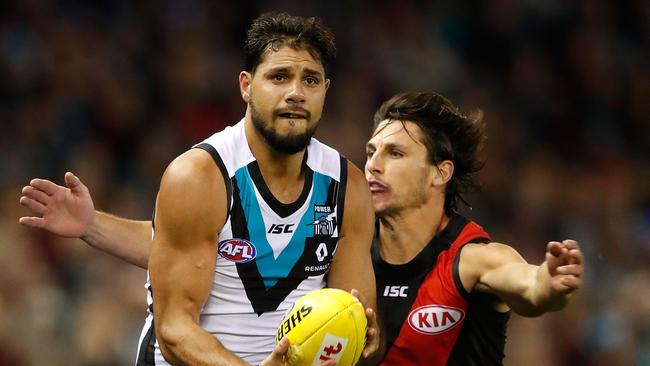 Patrick Ryder takes on Mark Baguley of his former club Essendon in Round 12 of the 2017 season. Picture: Adam Trafford/AFL Media/Getty Images