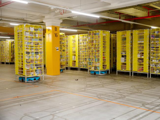 The robots bring shelving pods to workers. Picture: NewsWire / Nikki Short