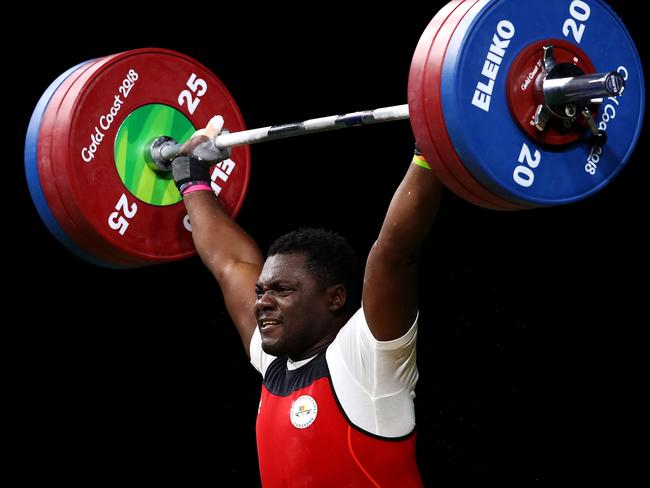 Petit David Minkoumba of Cameroon competed at the Men’s 94kg Weightlifting final at the 2018 Commonwealth Games before he disappeared. Picture: Mark Kolbe/Getty Images)