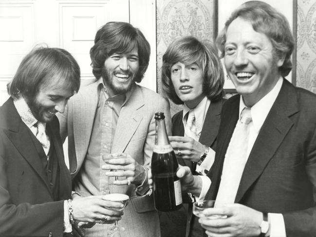 The Bee Gees with Robert Stigwood in 1970.