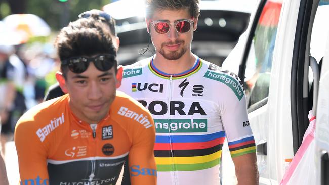 World Champion Slovakian rider Peter Sagan of team Bora-Hansgrohe (right) and Australian rider and race leader Caleb Ewan of team Mitchelton-Scott are seen before the start of stage four of the Tour Down Under from Norwood to Uraidla, South Australia, Friday, January 19, 2018. (AAP Image/Dan Peled) NO ARCHIVING, EDITORIAL USE ONLY