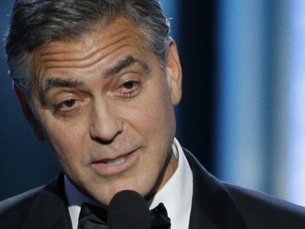 BEVERLY HILLS, CA - JANUARY 11: In this handout photo provided by NBCUniversal, George Clooney, Winner of the Cecile B. Demille Award, speaks onstage during the 72nd Annual Golden Globe Awards at The Beverly Hilton Hotel on January 11, 2015 in Beverly Hills, California. (Photo by Paul Drinkwater/NBCUniversal via Getty Images)