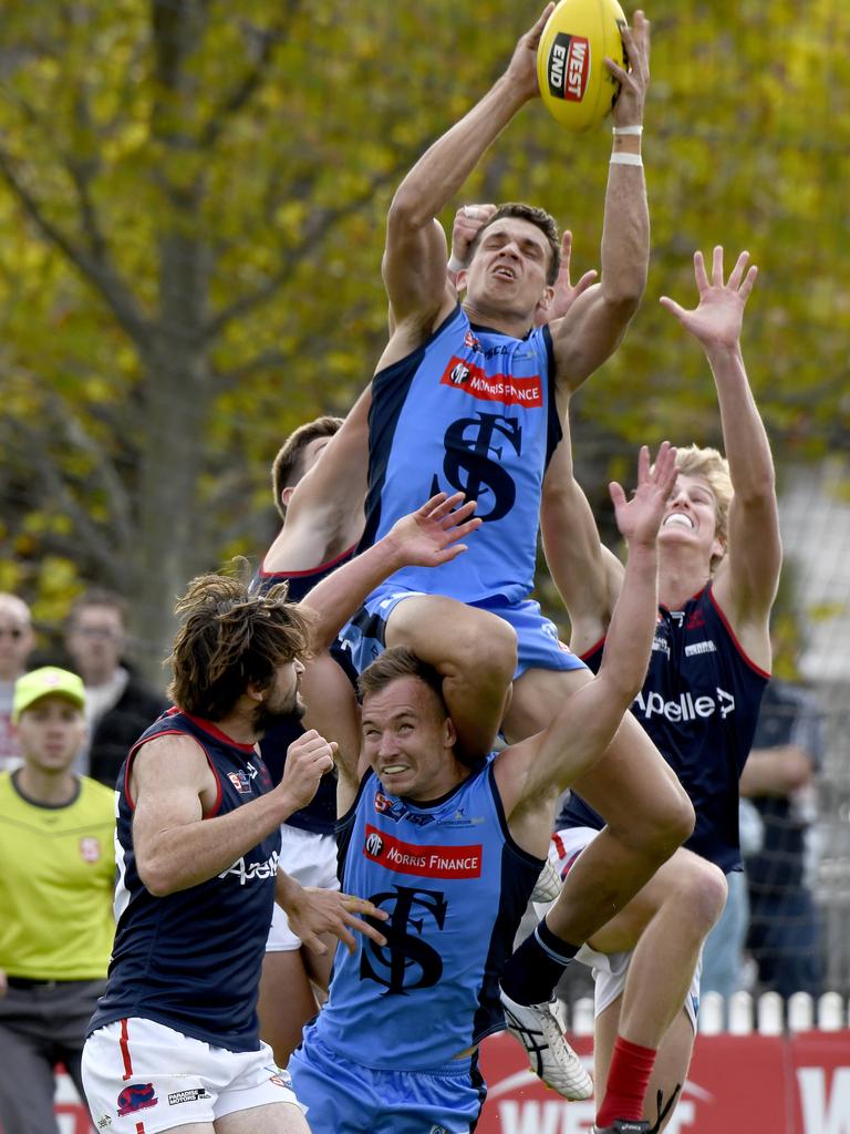 Sturt’s high-flying Ash Johnson takes a screamer against Norwood on Saturday. Picture: Naomi Jellicoe