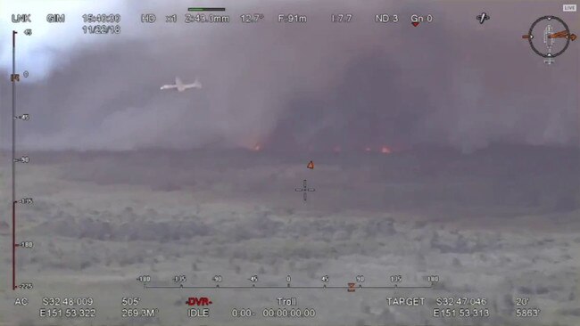 A large air tanker is being used to help firefighters near Salt Ash. Picture: Twitter/@NSWRFS