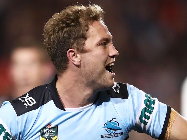 PENRITH, AUSTRALIA - JULY 13:  Matt Moylan of the Sharks celebrates scoring a try during the round 18 NRL match between the Panthers and the Sharks at Panthers Stadium on July 13, 2018 in Penrith, Australia.  (Photo by Matt King/Getty Images)