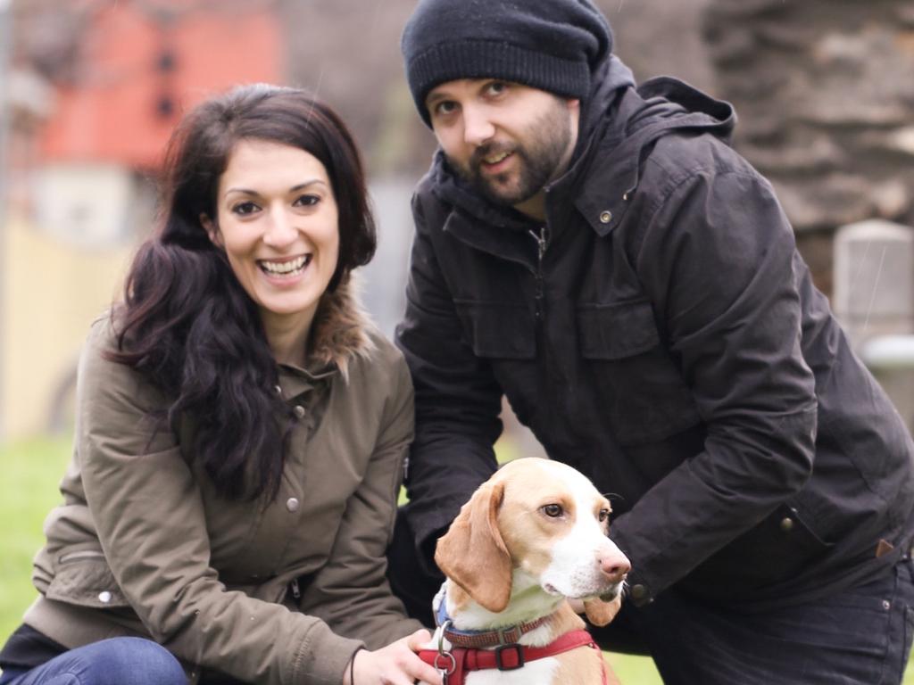 Avishan and Ryan Bird with Nala, who is healthier now but still needs ongoing medical care. Picture: Erin Germantis