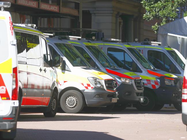 Ambulances waiting at the casualty entrance of RPA Hospital in Camperdown on Friday. Picture: John Grainger