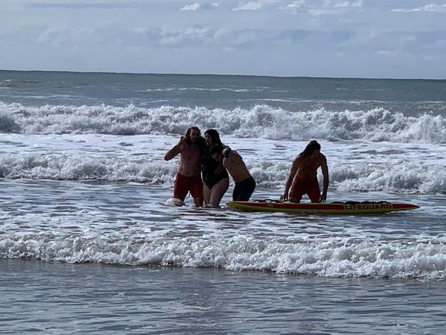 Surf Life Saving Queensland lifeguards rescued a woman and boy from rough surf at Alexandra Headland on Sunday morning.