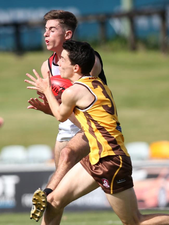 AFL Cairns Seniors 2019. Manunda Hawks v Cairns Saints at Cazalys. Saints' Joseph Kearsley and Hawks' Lex Morcom. PICTURE: STEWART MCLEAN