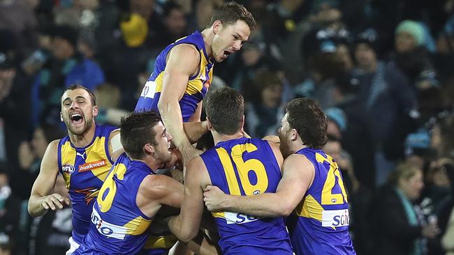 The Eagles celebrate their incredible win at Adelaide Oval. Picture Sarah Reed