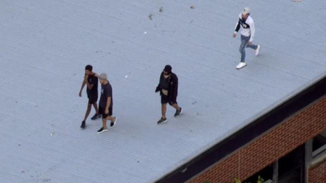 Inmates on the roof of Banksia Hill Juvenile Detention Centre amid an ongoing riot. Picture: Nine