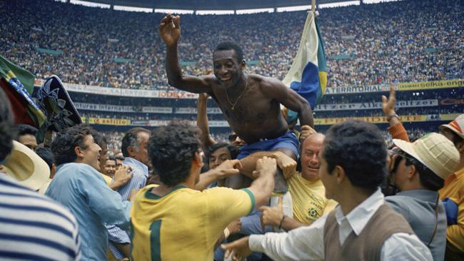 <a capiid="eed61ec8a56aacb3cbc10efee5f63da3" class="capi-video">How will the Socceroos go at the 2018 World Cup?</a> Brazil's Pele, centre, is hoisted on the shoulders of his teammates winning the 1970 final.