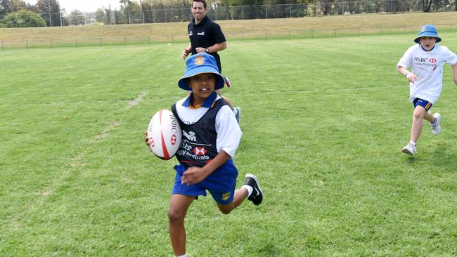 Students from St Andrews Public School participate in the rugby festival.