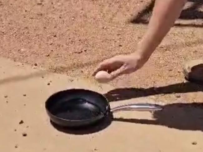 Frying an egg in 48.1 degrees in Oodnadatta , South Australia . Picture: The Pink Roadhouse