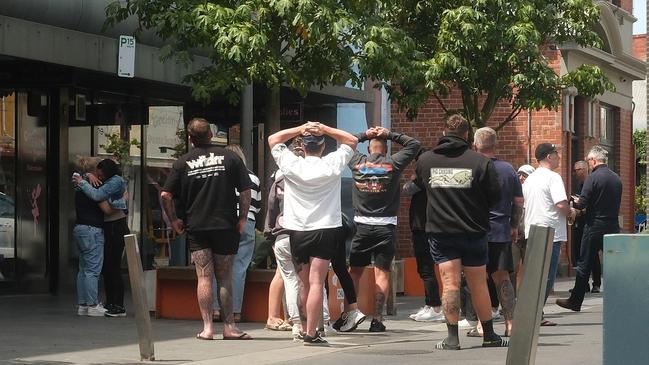 Friends and family of allegedly murdered Corio man Jayme Sykes gather in Little Malop St to lay flowers and pay tribute to the 20-year-old