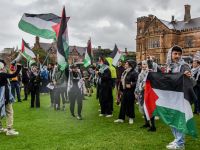 Members of the Australian Palestinian community shout slogans at the Palestinian Protest Campsite at University of Sydney in Sydney on May 3, 2024. (Photo by Ayush Kumar / AFP)