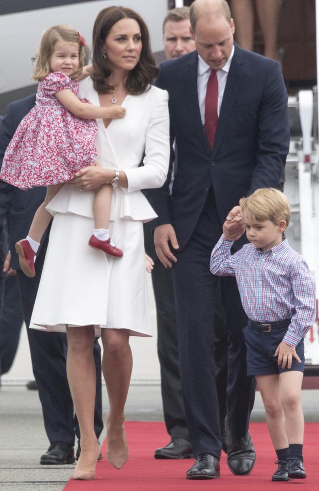 Prince William, Duke of Cambridge and Catherine, Duchess of Cambridge with their children Prince George and Princess Charlotte arrive at Warsaw airport to start a 3 day tour on July 17, 2017. Picture: Arthur Edwards / Pool/ Getty Images.