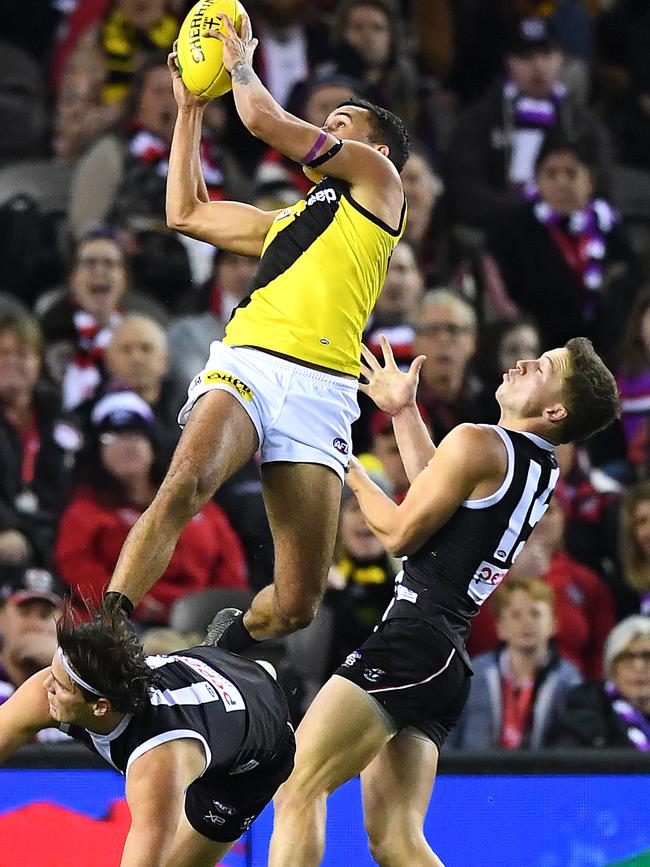 Stack takes a hanger over Hunter Clark. Picture: Getty Images