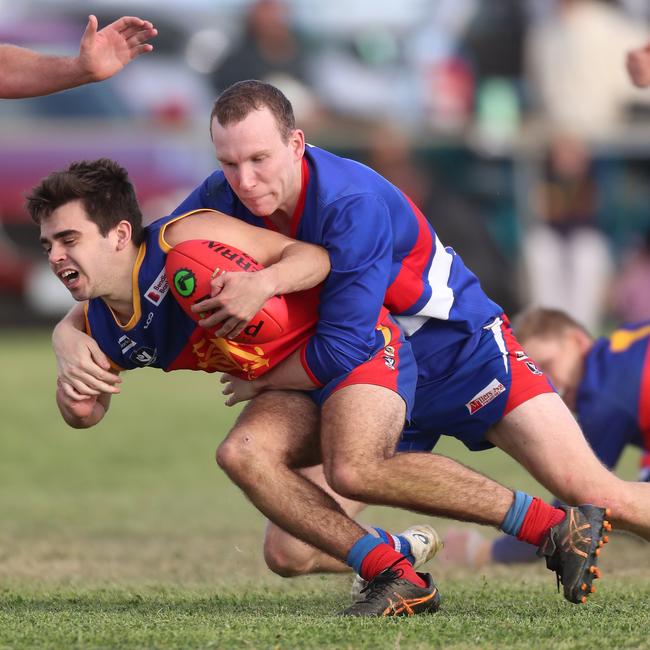 Pyramid Hill’s Zac Dingwall tackles Marong’s Noah McCaig.