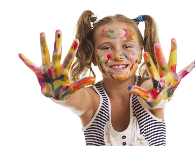 Happy concept. Young girl with paint on her hands, happy girl, child finger painting, teenager, pigtails, girl with paint on her face, hands happiness, generic, thinkstock, blond hair, kids activities