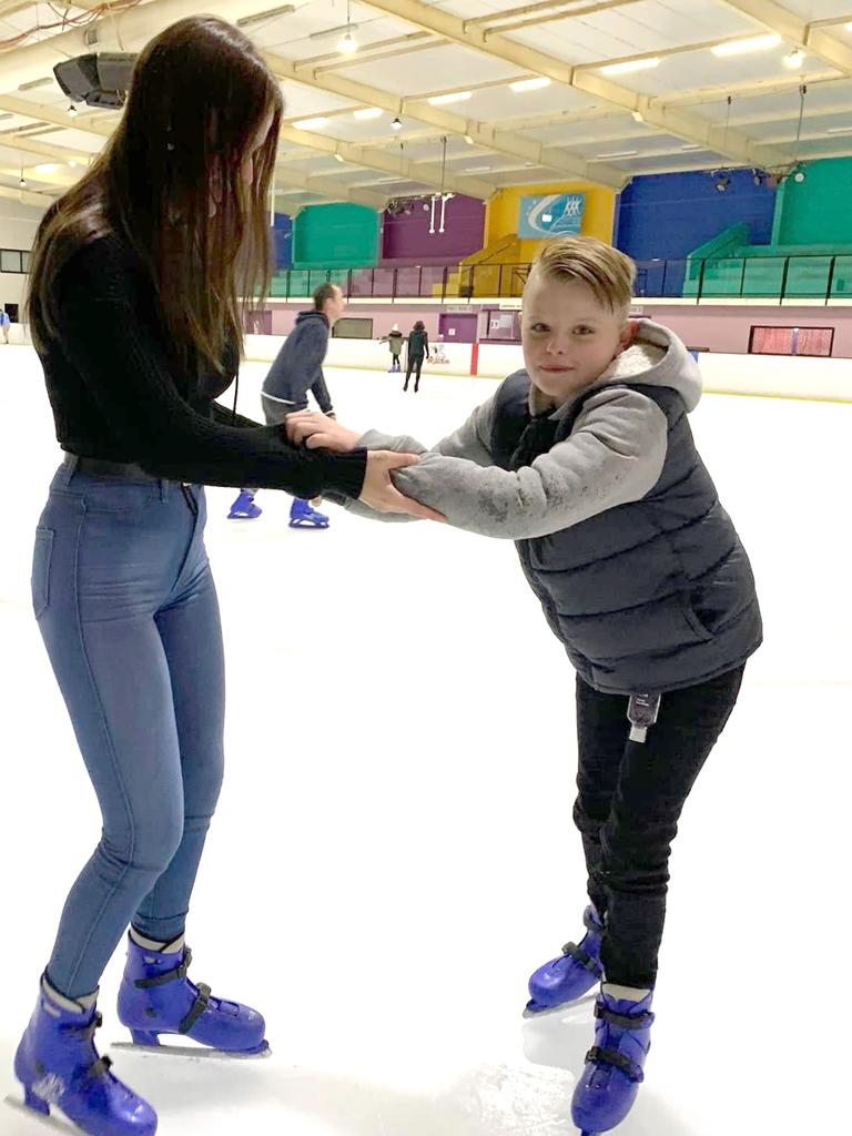 Tristian Frahm with his aunt Gemma Thorley, was remembered as a boy with “striking blue eyes who felt a deep connection with animals and loved spending time in nature”. Photo: Supplied
