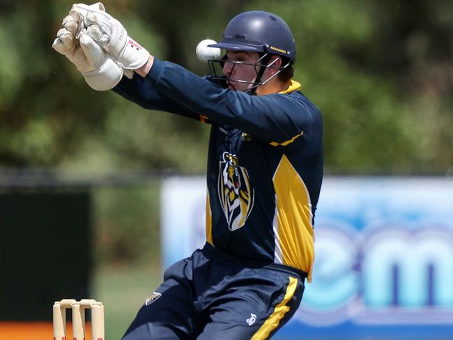 VSDCA: Balwyn’s Thomas Gill hit in the helmet. Picture: Georg Sal