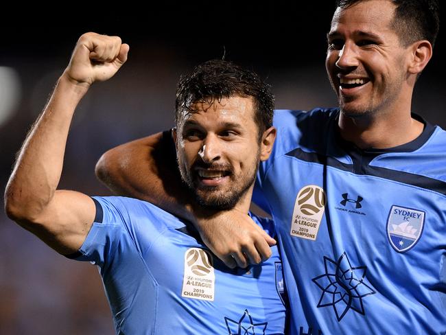 Kosta Barbarouses of Sydney (left) celebrates with Ryan McGowan after scoring a goal during the round 4 A-League match between Sydney FC and Newcastle Jets at Leichhardt Oval in Sydney, Friday, November 1, 2019. (AAP Image/Dan Himbrechts) NO ARCHIVING, EDITORIAL USE ONLY