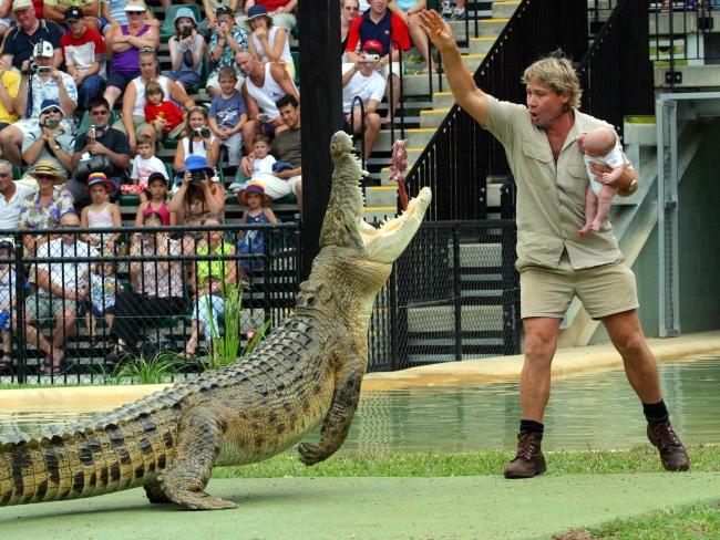 Steve Irwin holding a little Robert Irwin in 2004. Picture: The Mega Agency