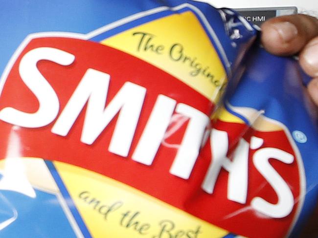 Machine operator Faraaz Abdullah posing at the Smith Chip Snack Foods, Brisbane 18th of November 2019.   (AAP Image/Josh Woning)