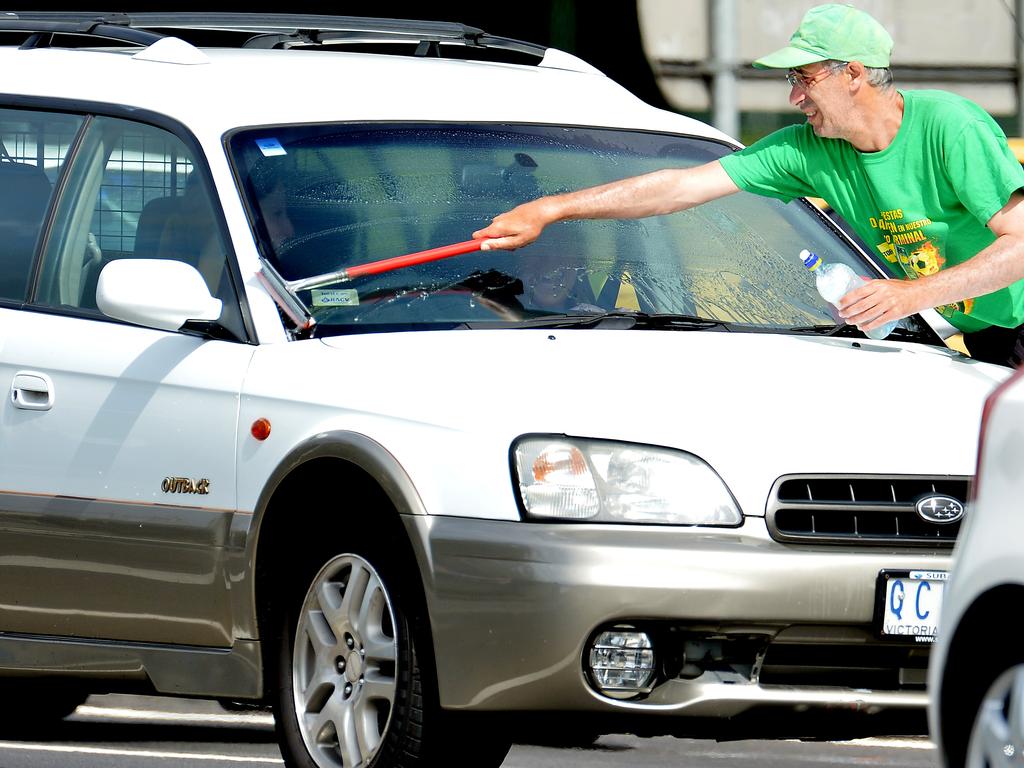Paying a window washer could cost you a lot more than you think.