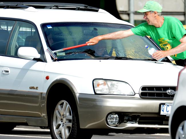 Paying a window washer could cost you a lot more than you think.