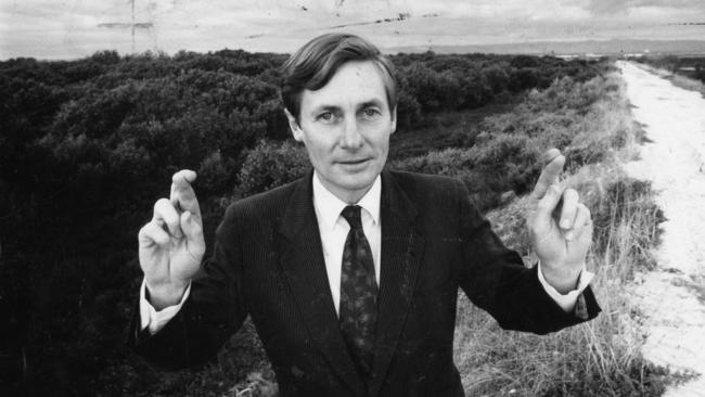 SA Premier John Bannon keeps his finger crossed while inspecting the proposed Multi-Function Polis (MFP) site at Gillman in 1990.