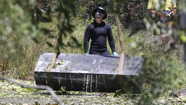 Police found the box while searching for the remains of two suspected homicide victims in Logan. Picture: Jono Searle