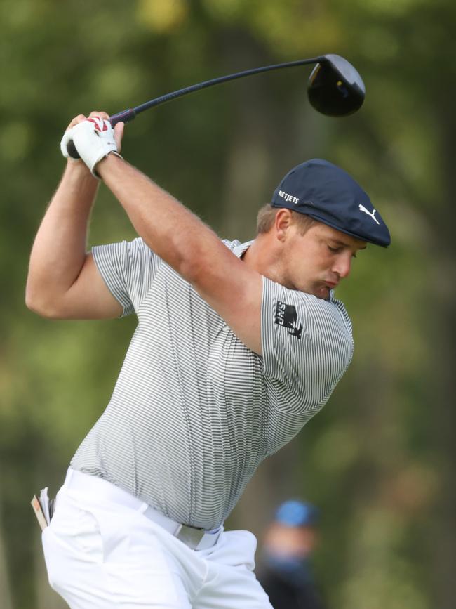 DeChambeau rips a drive during his triumph.