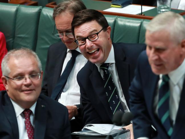 David Littleproud enjoying the banter from Deputy Prime Minister and Minister for Infrastructure, Transport and Regional Development Michael McCormack during Question Time in the House of Representatives in Parliament House in Canberra. Picture Gary Ramage