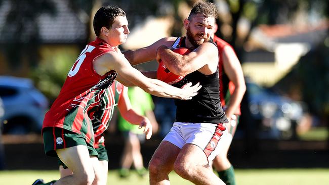 Para Hills' Lynton Power is tackled by North Pines' Justin Wakefield in a game last year. Picture: Bianca De Marchi