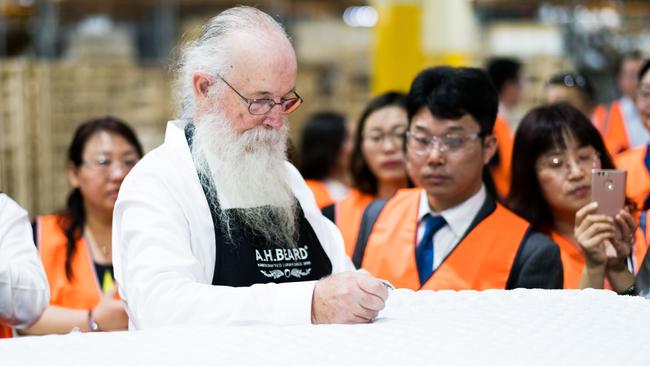 Master bedmaker Neville Middleton works on a mattress at A.H. Beard’s Padstow factory. Picture: Ben Symons.