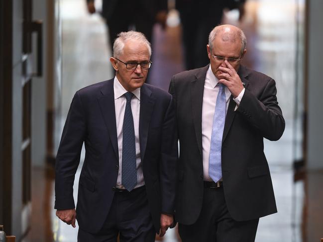 Australian Prime Minister Malcolm Turnbull and Australian Treasurer Scott Morrison arrive for the vote to adjourn the House of Representatives. Picture: AAP