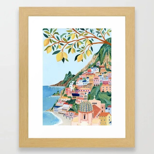 Framed Positano Italy print (medium) is from $116 at society6.com – try affixing with command strips to avoid putting holes in the wall. Picture: supplied