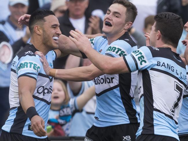 Valentine Holmes of the Sharks breaks the Cronulla try scoring record after scoring during the Round 24 NRL match between the Cronulla-Sutherland Sharks and the Newcastle Knights at Southern Cross Group Stadium in Sydney, Sunday, August 26, 2018. (AAP Image/Craig Golding) NO ARCHIVING, EDITORIAL USE ONLY