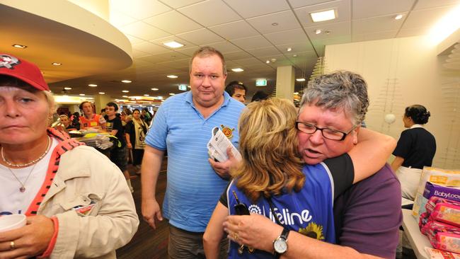 Flood affected residents at the QE-2 Flood Evacuation centre at Nathan in Brisbane. Picture: AAP Image/Tony Phillips