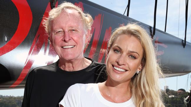 Pictured at Woowlich Dock in Sydney on his racing yacht Comanche is Jim Clarke with partner Kristy Hinze ahead of their participation in the 2015 Sydney to Hobart Yacht Race. Picture: Richard Dobson