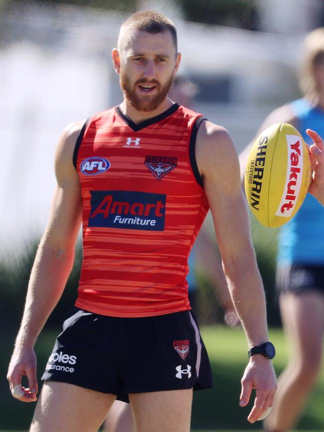 Dyson Heppell’s (left) leadership has shone while in rehabilition in the Gold Coast hub. Picture: Michael Klein